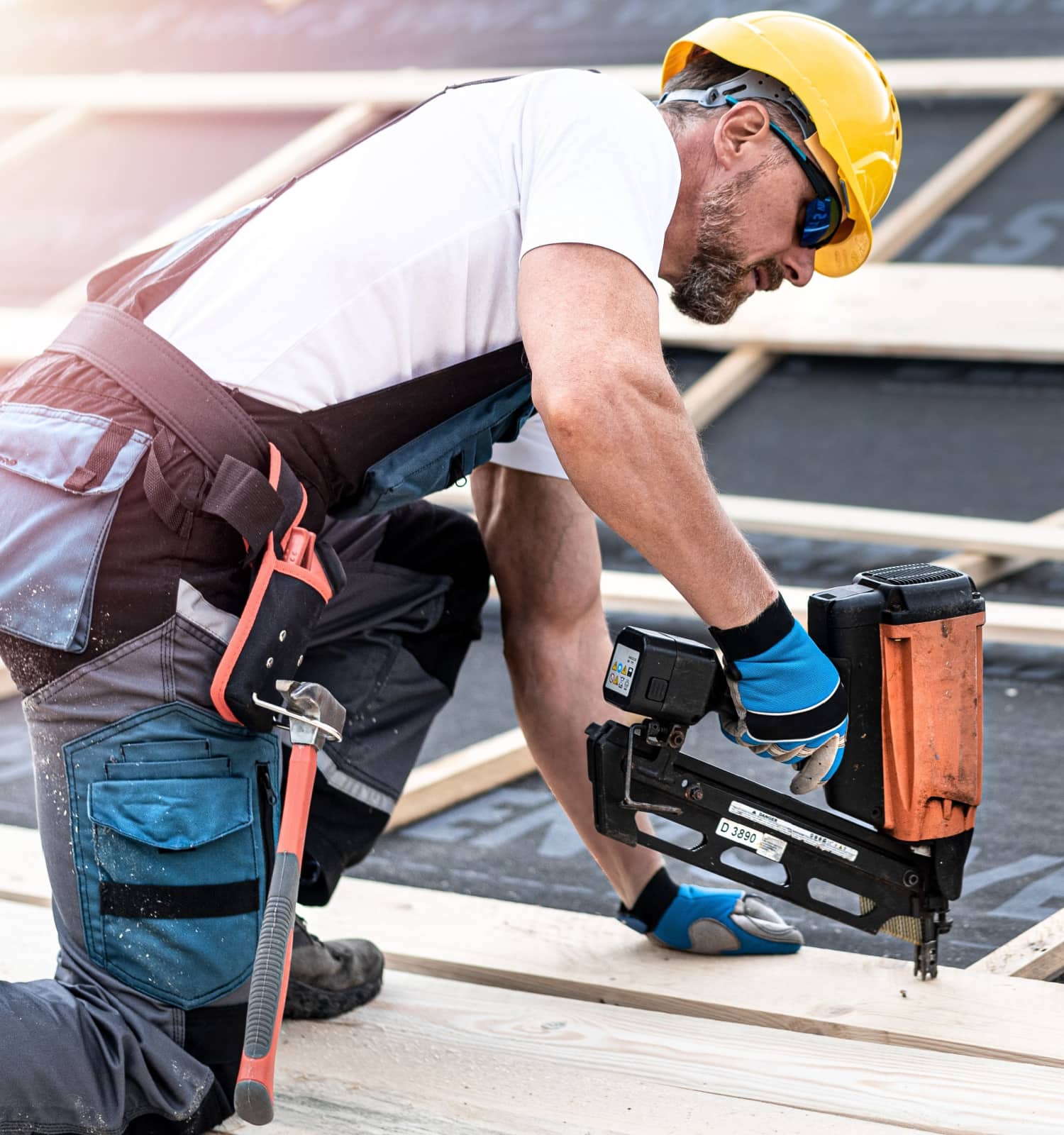 roofer working on roof skyluxe construction