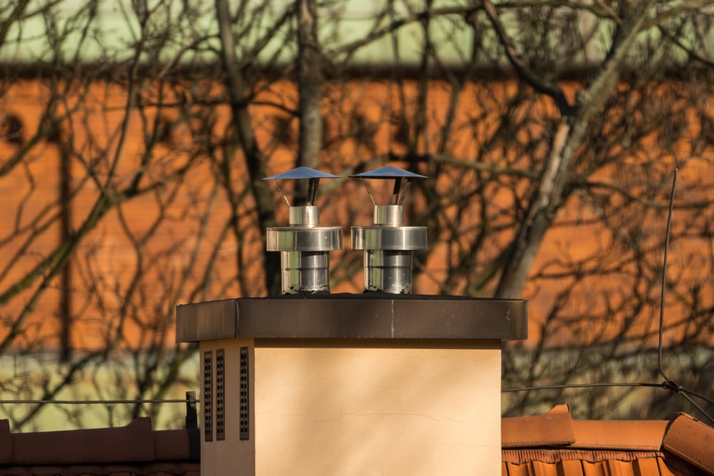 Pair Of Stainless Steel Chimneys With Caps